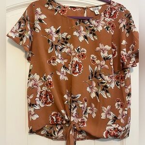 Size medium floral top with tie bottom. Only worn a few times.